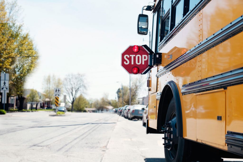 Bus stopped in a neighborhood.
